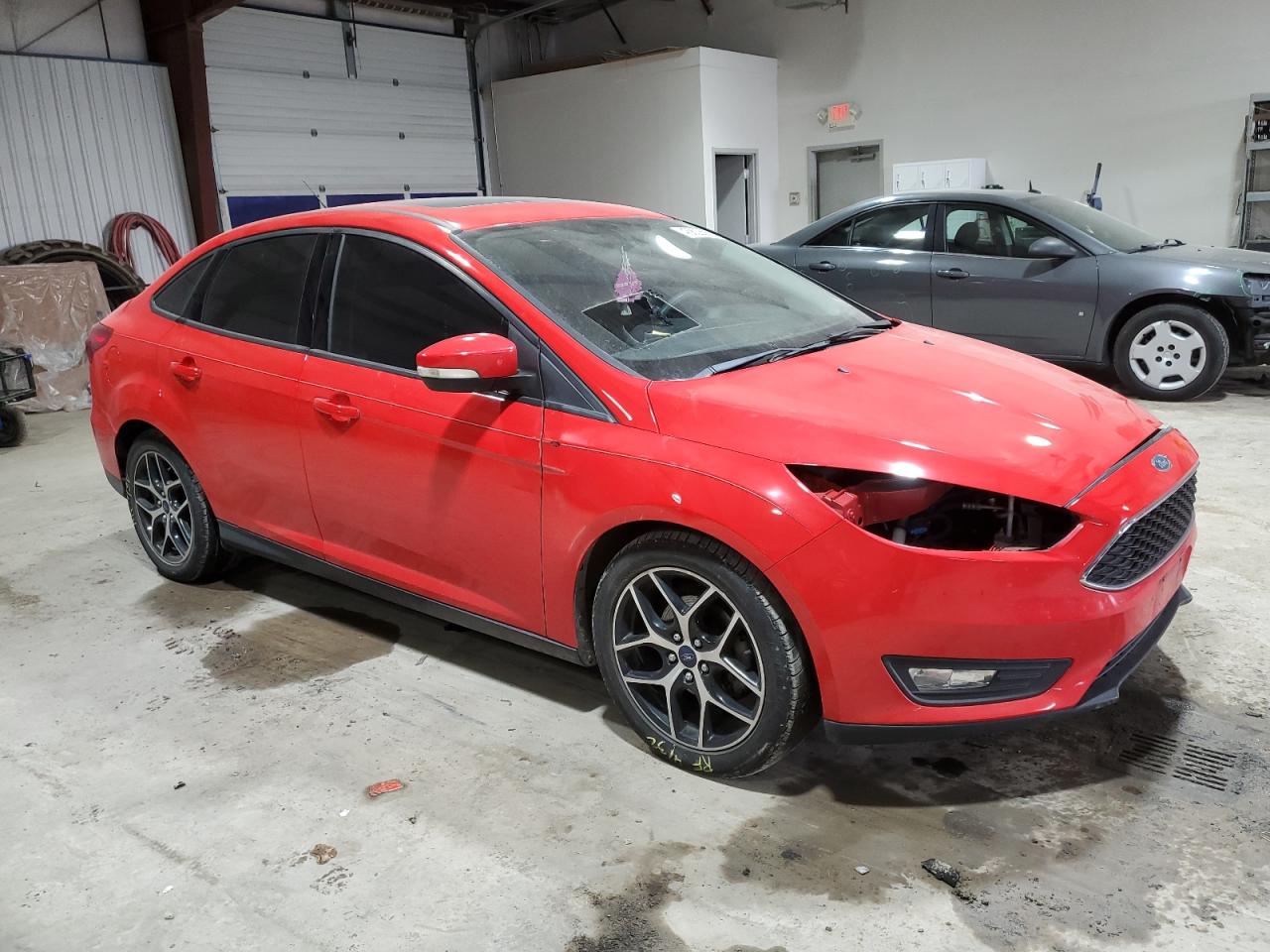 2017 Ford Focus VIN 1FADP3H22HL228411 Copart auction photo, front end damage thumbnail 4
