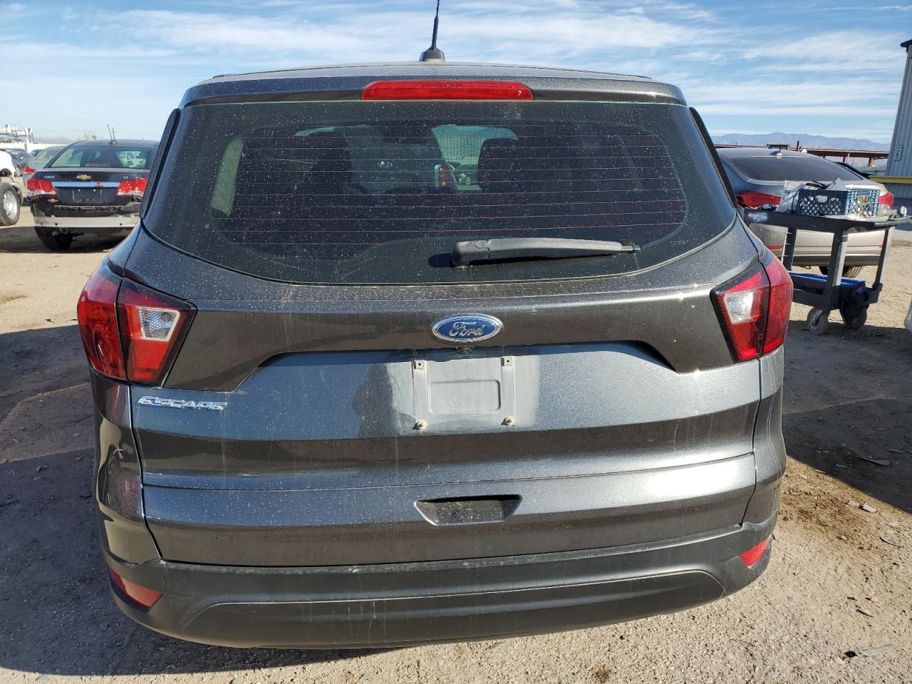 2019 Ford Escape VIN 1FMCU0F73KUB86632 Copart auction photo, side / front end damage thumbnail 6