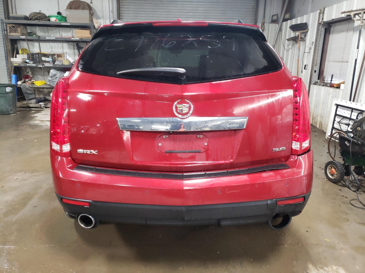 2012 Cadillac SRX VIN 3GYFNAE35CS586707 Copart auction photo, all over damage thumbnail 6