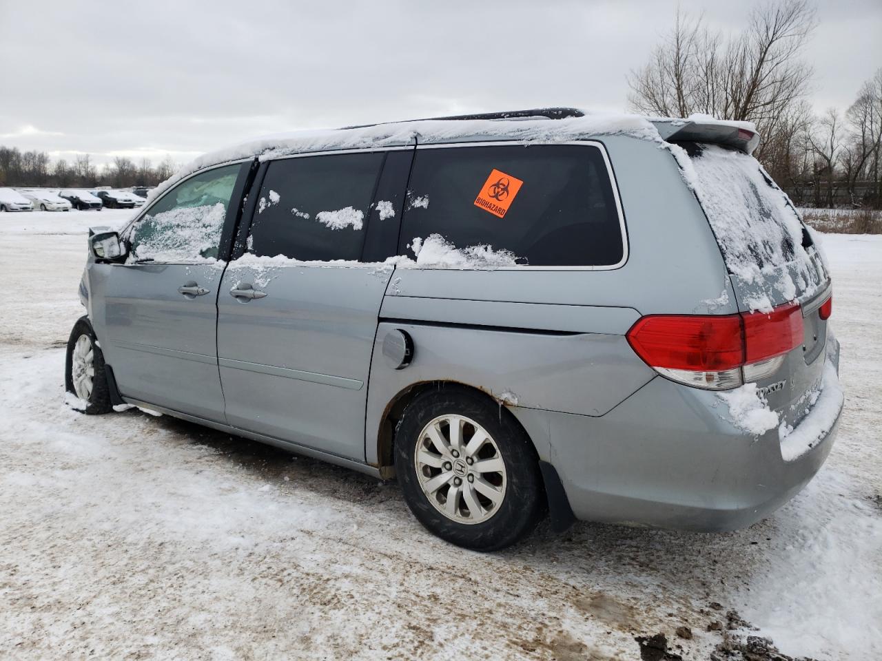 2010 Honda Odyssey VIN 5FNRL3H40AB002664 Copart auction photo, front end / undercarriage damage thumbnail 2