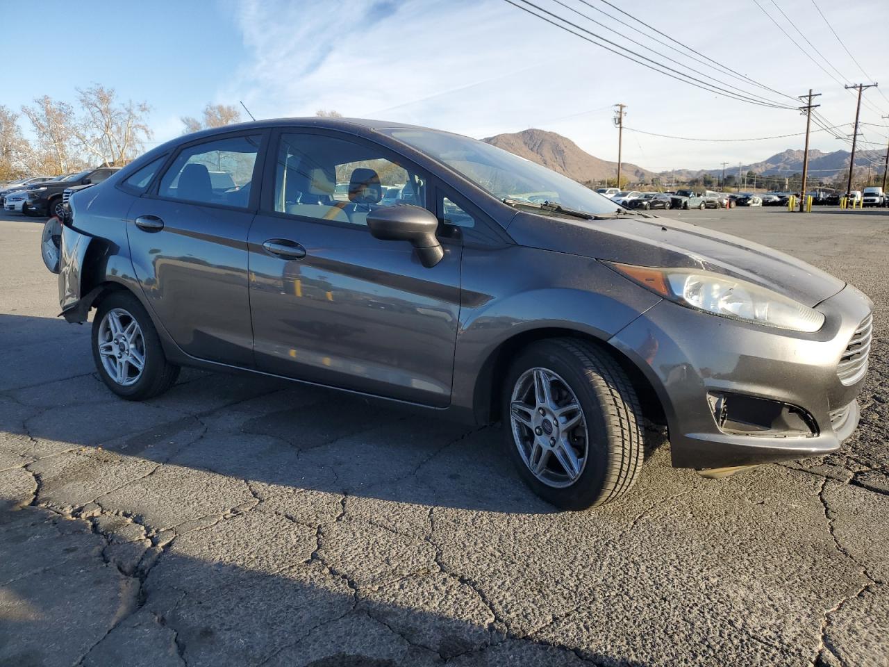 2017 Ford Fiesta VIN 3FADP4BJ9HM138628 Copart auction photo, rear end / side damage thumbnail 4