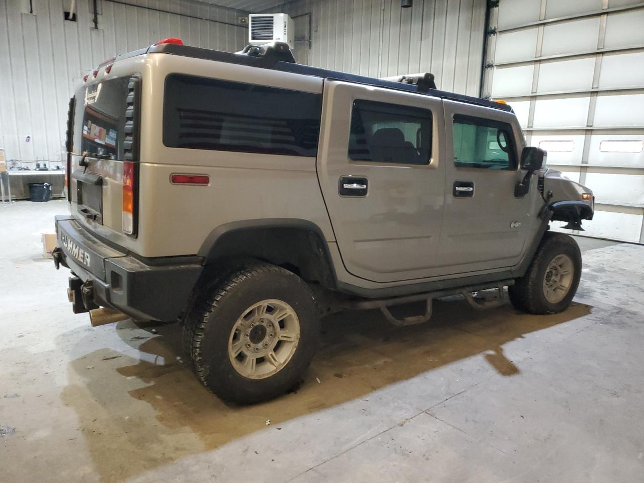 2004 Hummer H2 VIN 5GRGN23U94H110447 Copart auction photo, front end damage thumbnail 3