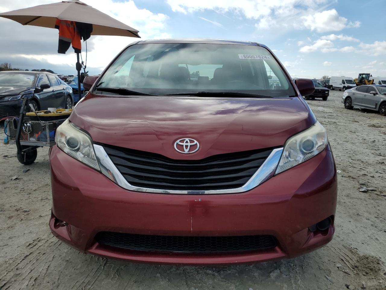 2014 Toyota Sienna VIN 5TDKK3DC6ES414963 Copart auction photo, front end / all over damage thumbnail 5