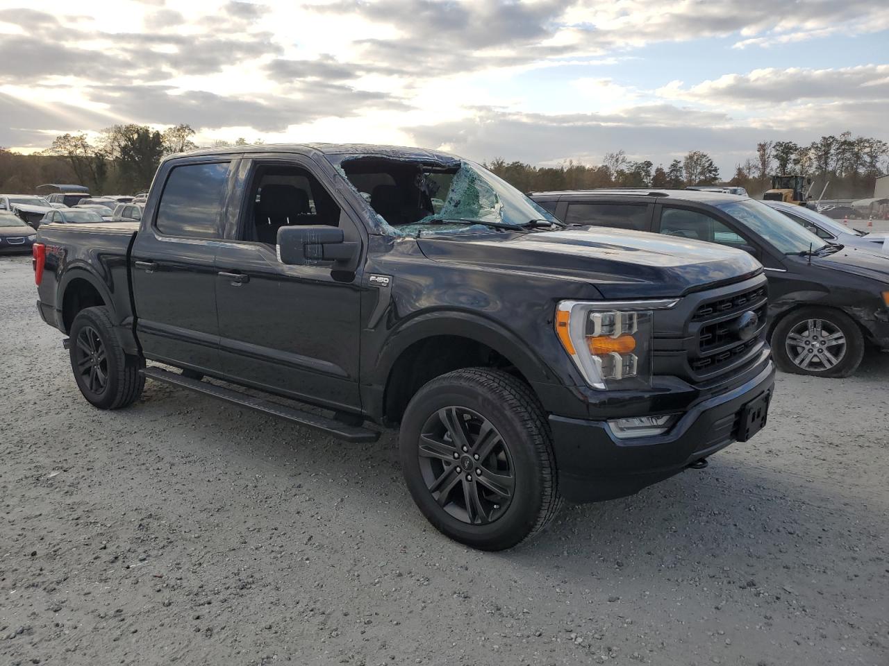 2021 Ford F-150 VIN 1FTFW1E57MFC20693 Copart auction photo, top/roof / side damage thumbnail 4