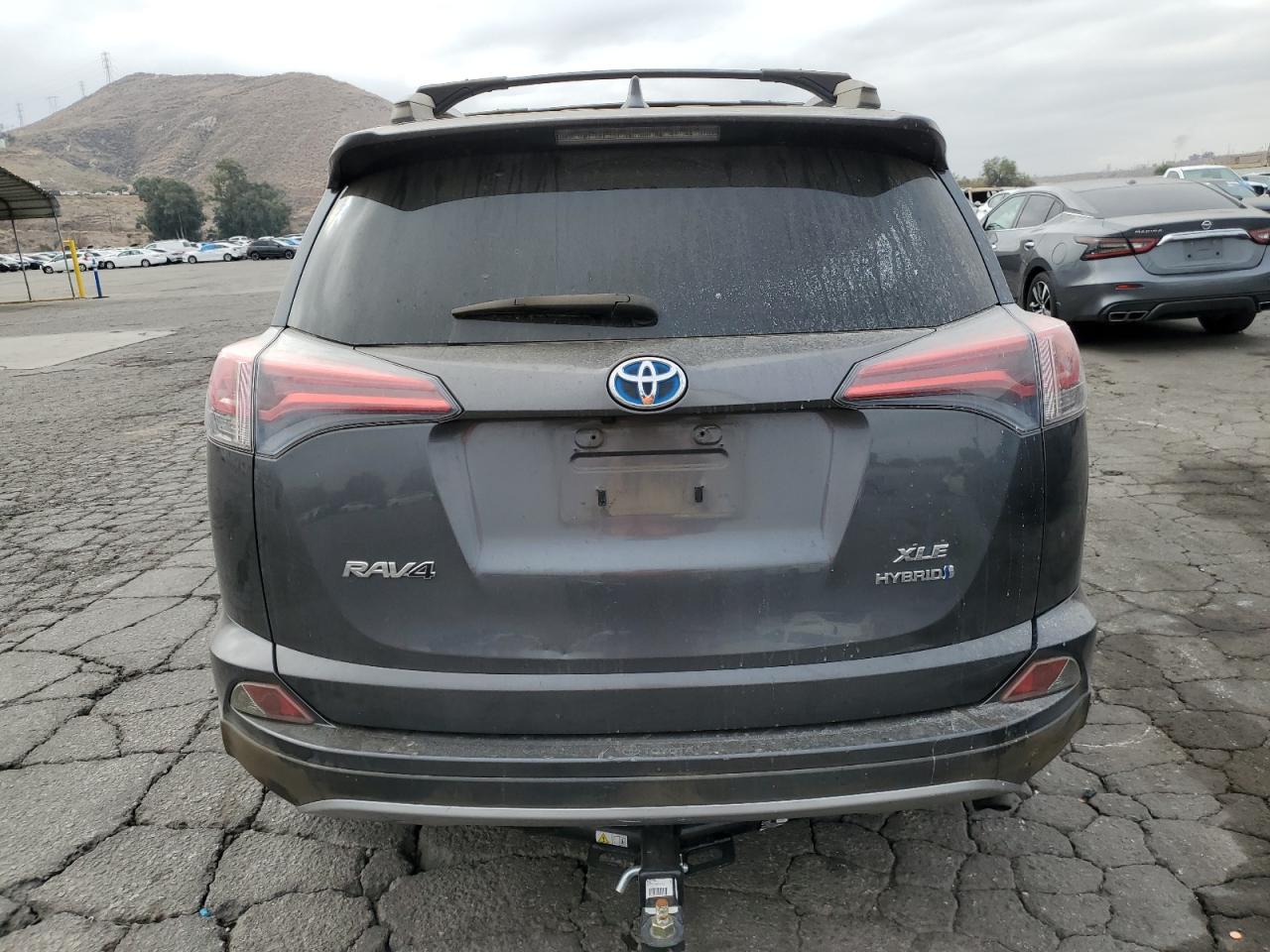 2017 Toyota RAV 4 VIN JTMRJREV9HD063664 Copart auction photo, burn damage thumbnail 6