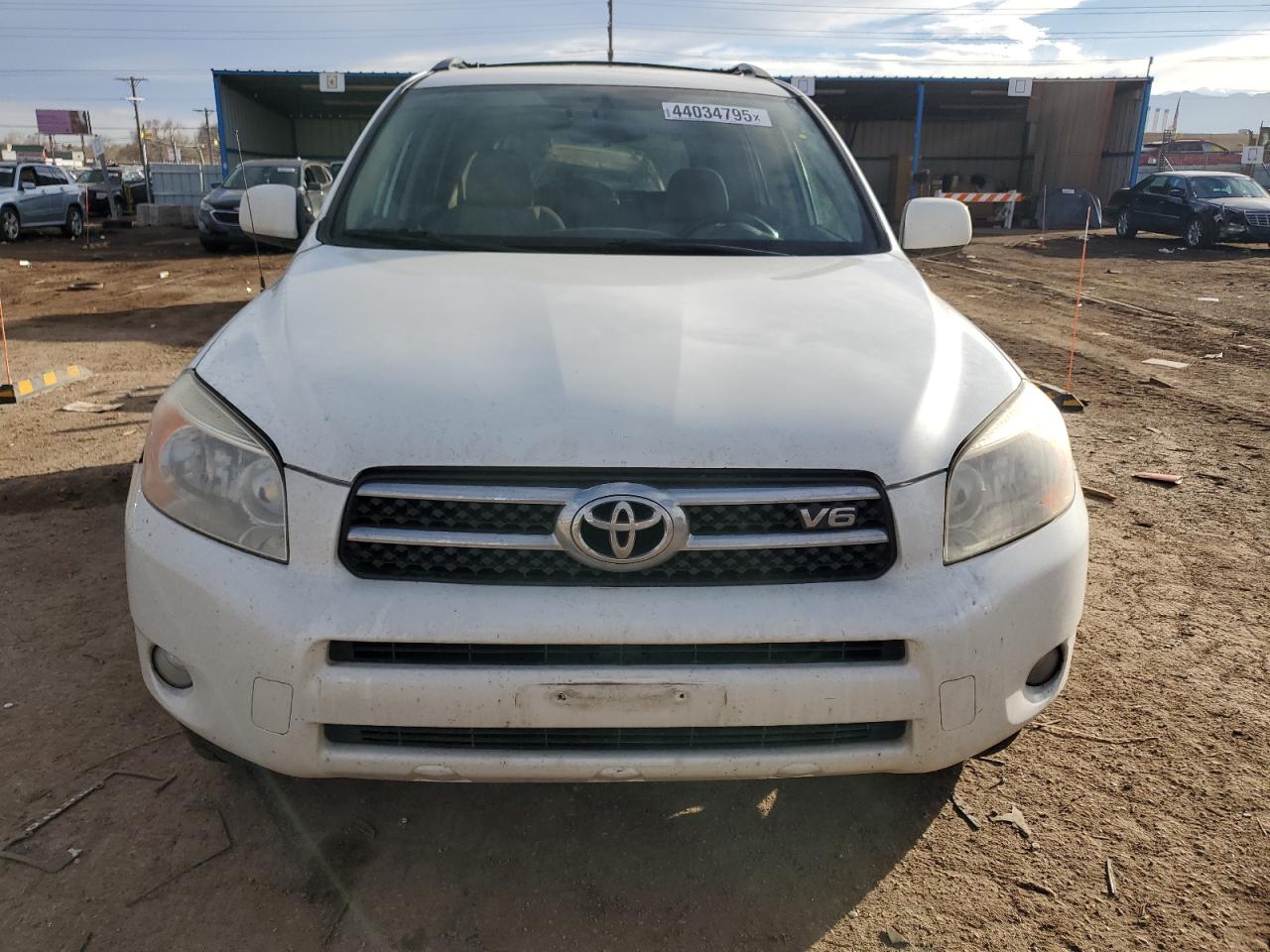 2007 Toyota RAV 4 VIN JTMBK31V375037698 Copart auction photo, side / front end damage thumbnail 5