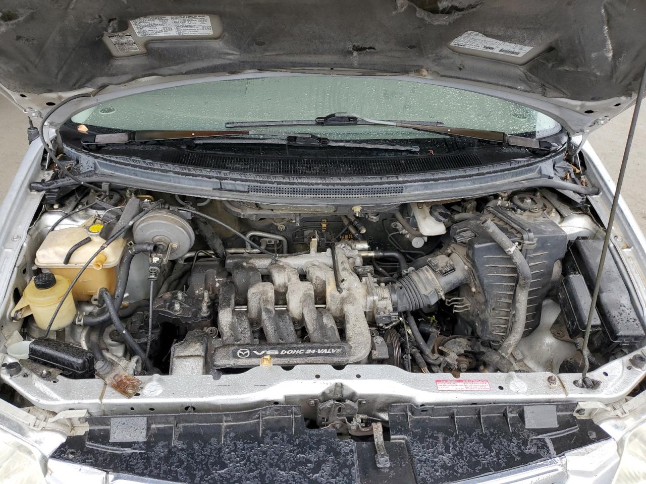 2000 Mazda MPV VIN JM3LW28G7Y0129123 Copart auction photo, minor dent/scratches damage thumbnail 14