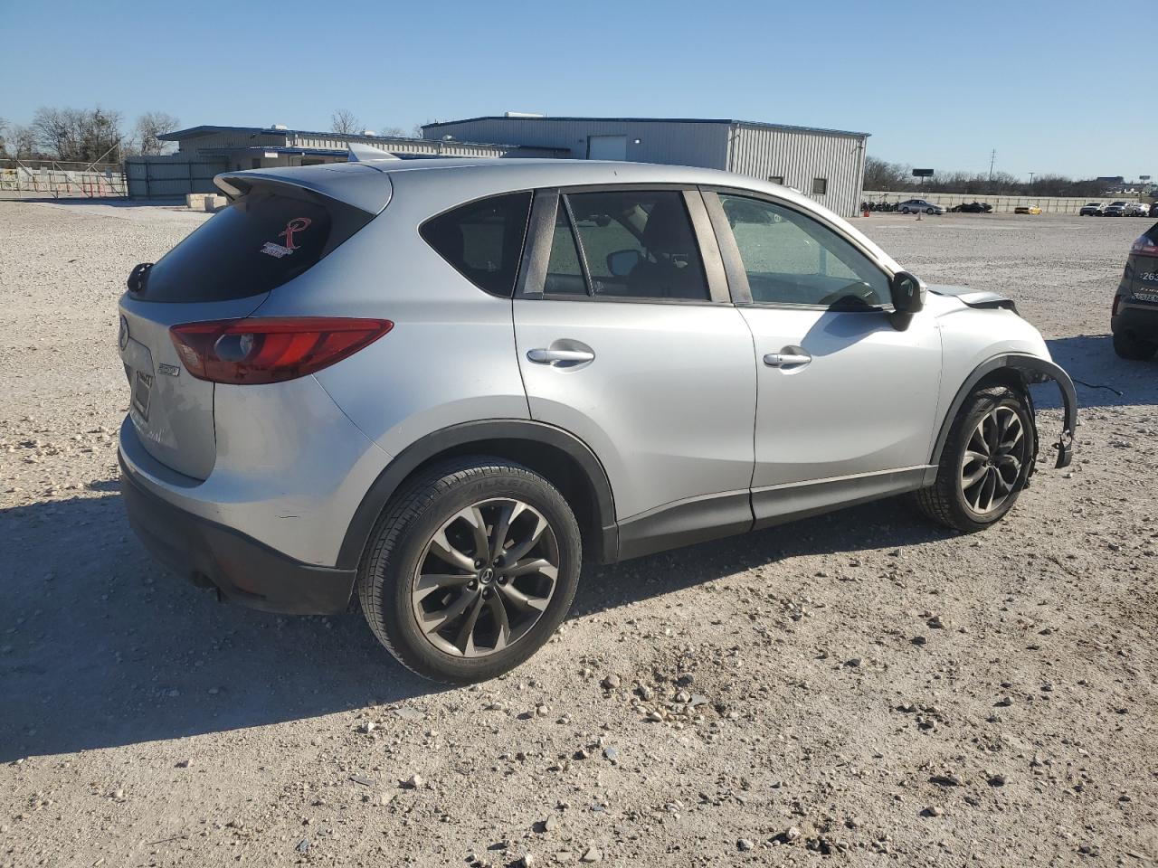 2016 Mazda CX-5 VIN JM3KE2DYXG0630017 Copart auction photo, front end / minor dent/scratches damage thumbnail 3