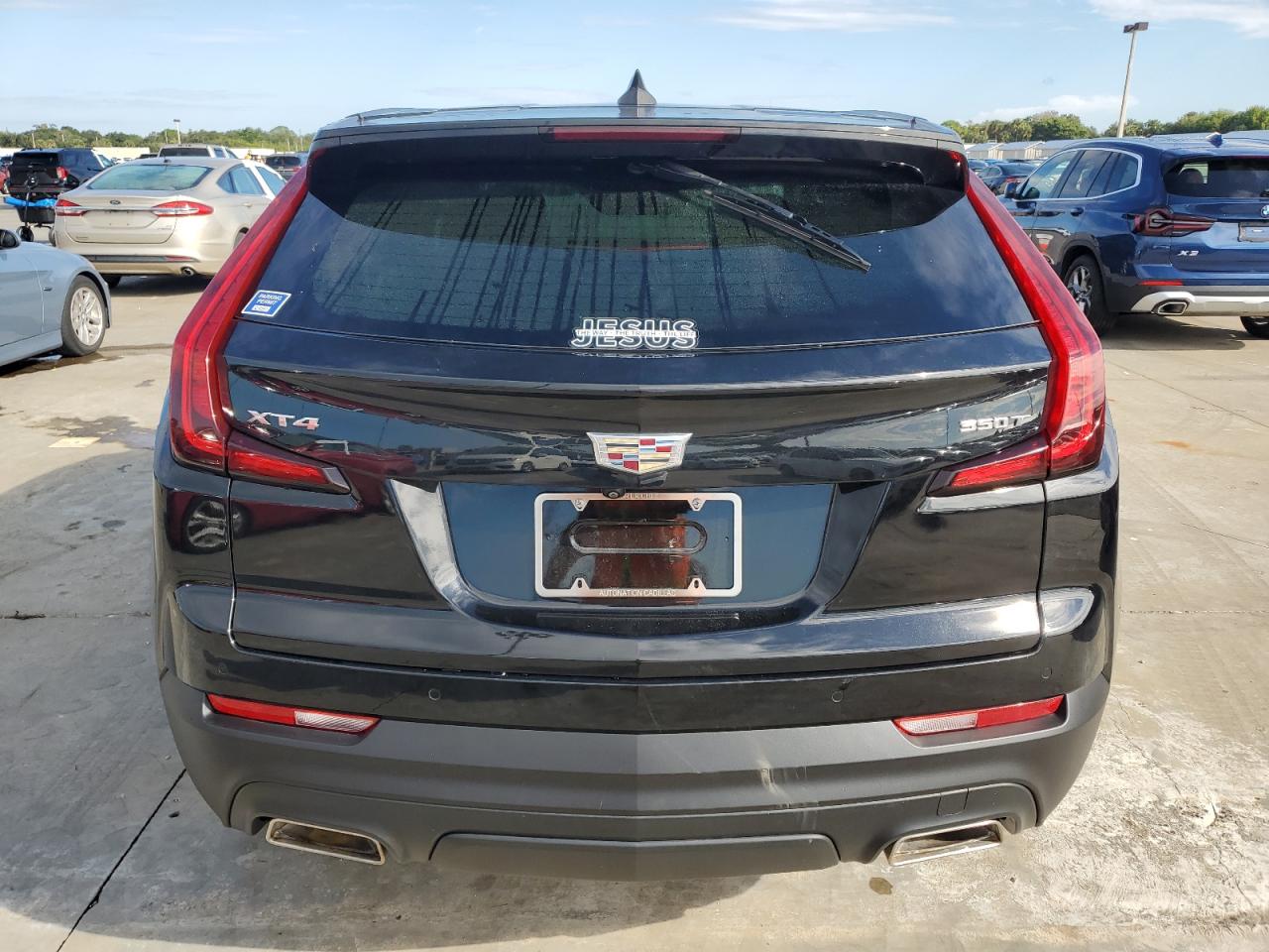 2021 Cadillac XT4 VIN 1GYAZAR46MF044796 Copart auction photo, water/flood damage thumbnail 6