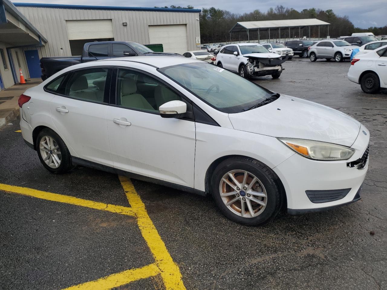 2015 Ford Focus VIN 1FADP3F23FL264107 Copart auction photo, front end / rear end damage thumbnail 4