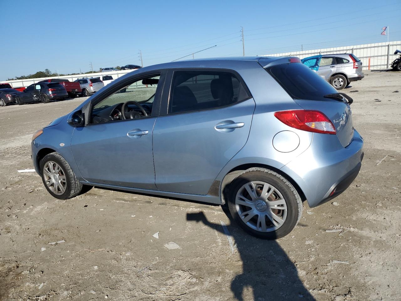 2013 Mazda 2 VIN JM1DE1KY4D0170735 Copart auction photo, side damage thumbnail 2