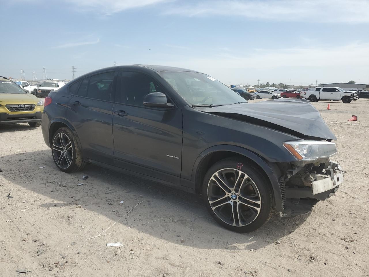 2016 BMW X4 VIN 5UXXW3C58G0M89813 Copart auction photo, front end / minor dent/scratches damage thumbnail 4