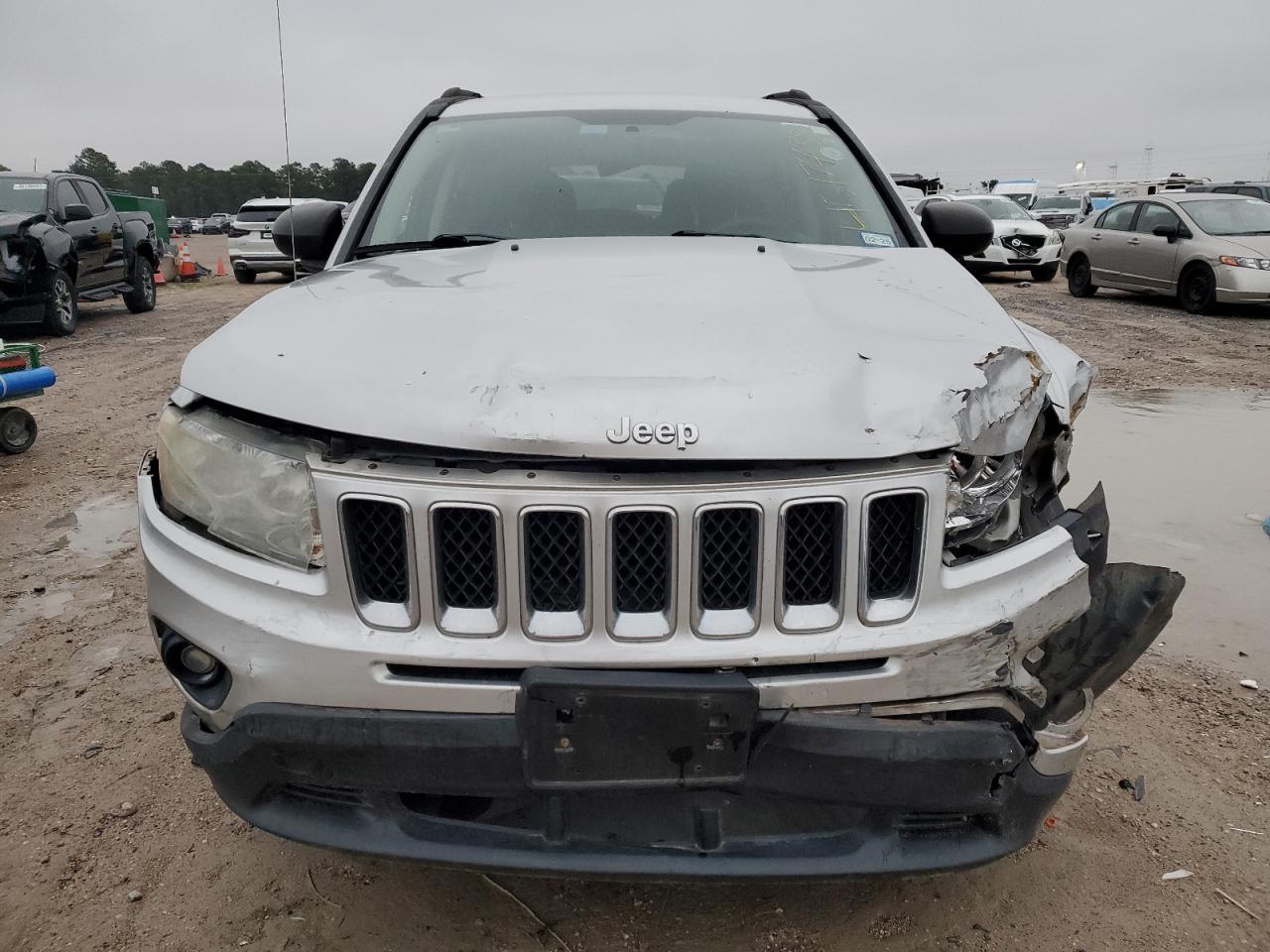 2012 Jeep Compass VIN 1C4NJCBA3CD500600 Copart auction photo, front end / side damage thumbnail 5