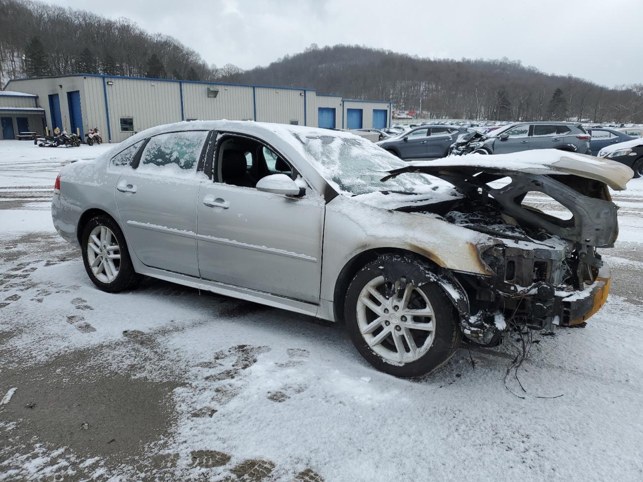 2012 Chevrolet Impala VIN 2G1WC5E34C1327701 Copart auction photo, burn - engine damage thumbnail 4