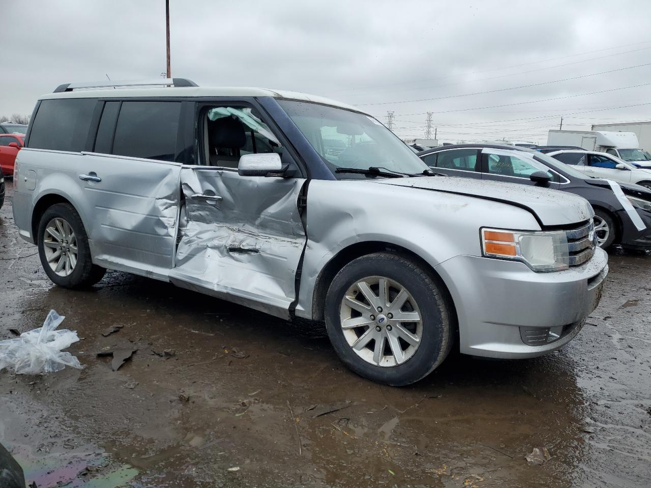 2012 Ford Flex VIN 2FMGK5CC4CBD16382 Copart auction photo, side / front end damage thumbnail 4