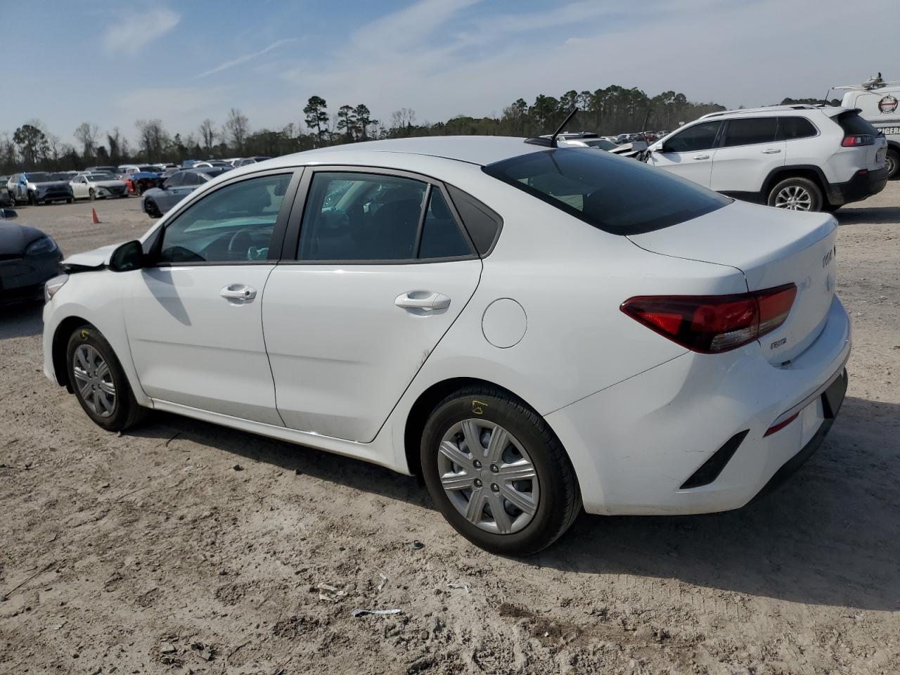 2023 KIA Rio VIN 3KPA24AD1PE597734 Copart auction photo, front end / minor dent/scratches damage thumbnail 2