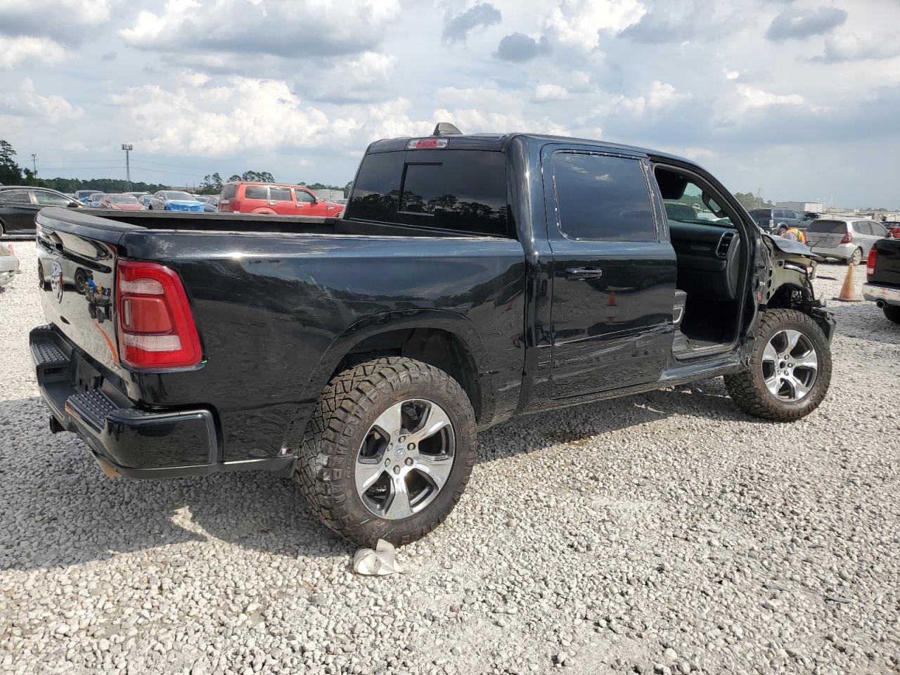 2020 RAM 1500 VIN 1C6SRFJT1LN386713 Copart auction photo, side / front end damage thumbnail 3