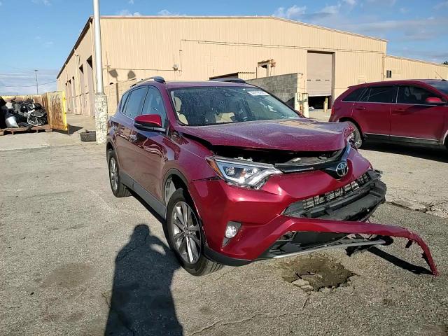 2018 Toyota RAV 4 VIN JTMYFREVXJD121929 Copart auction photo, front end / side damage thumbnail 11