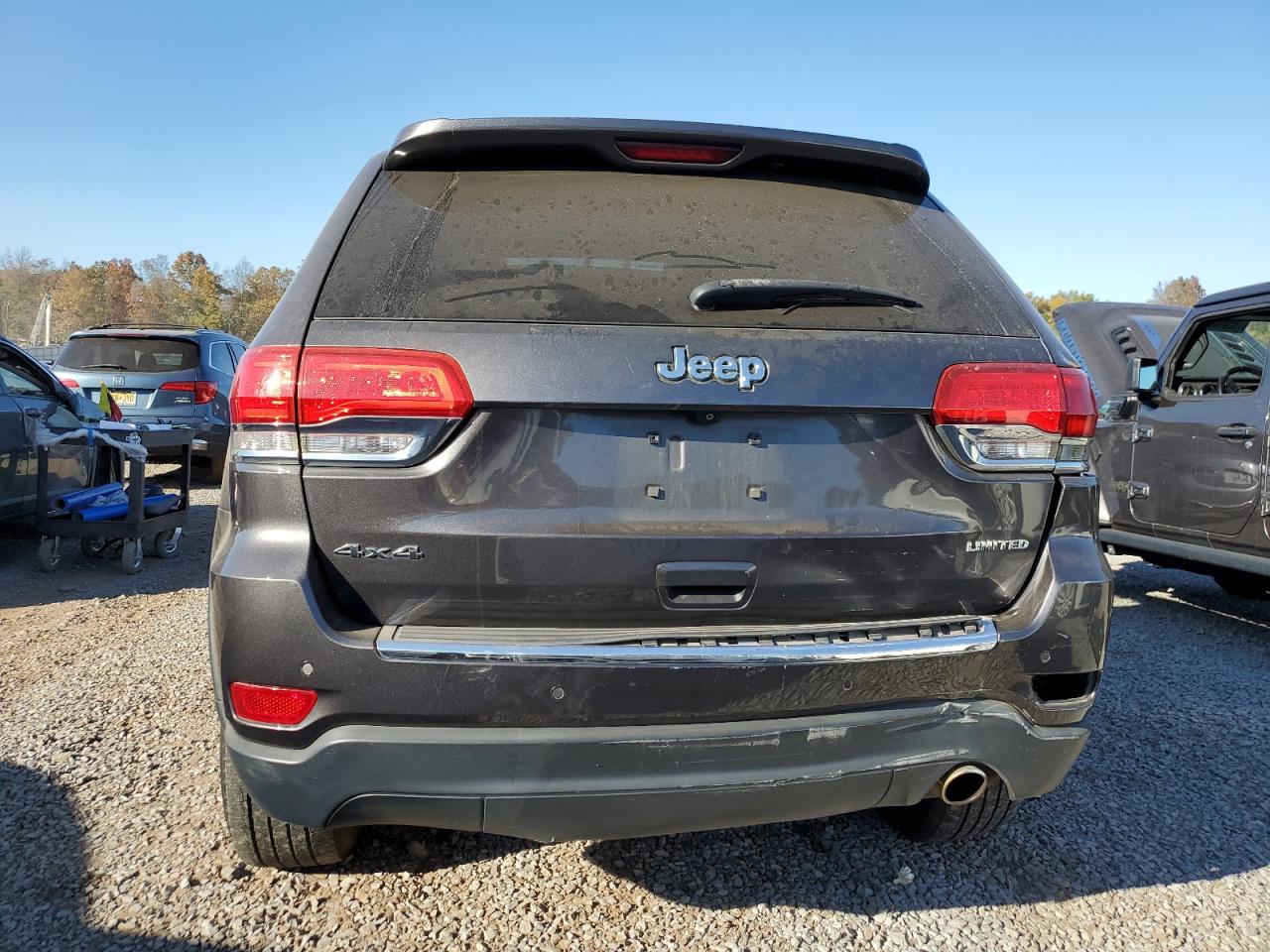 2015 Jeep Grand Cherokee VIN 1C4RJFBG7FC828944 Copart auction photo, front end / rear end damage thumbnail 6