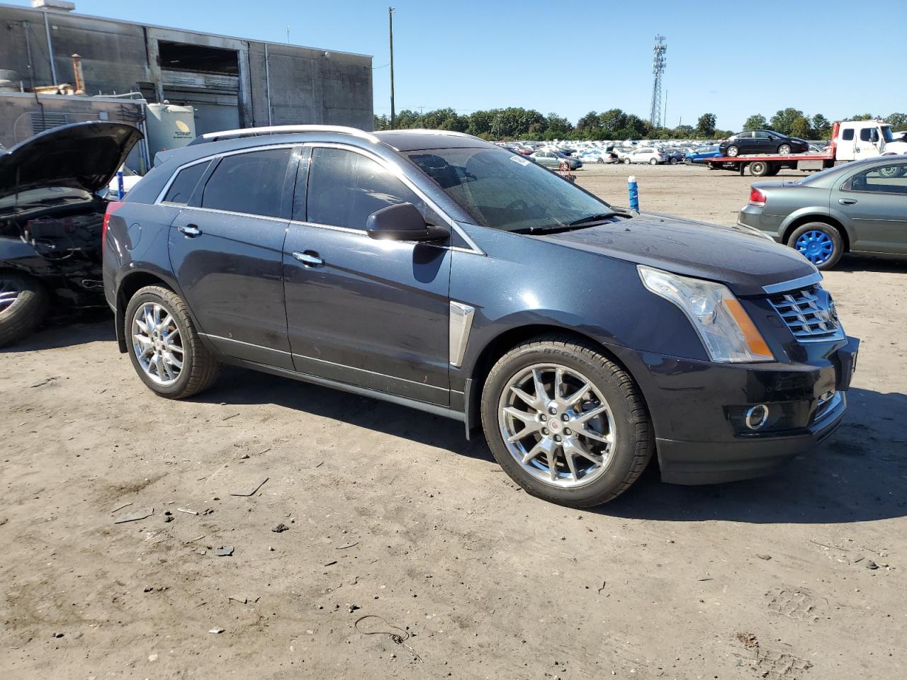 2014 Cadillac SRX VIN 3GYFNFE33ES560428 Copart auction photo, front end / minor dent/scratches damage thumbnail 4