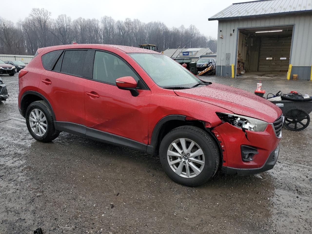 2016 Mazda CX-5 VIN JM3KE4CY4G0743569 Copart auction photo, front end / side damage thumbnail 4
