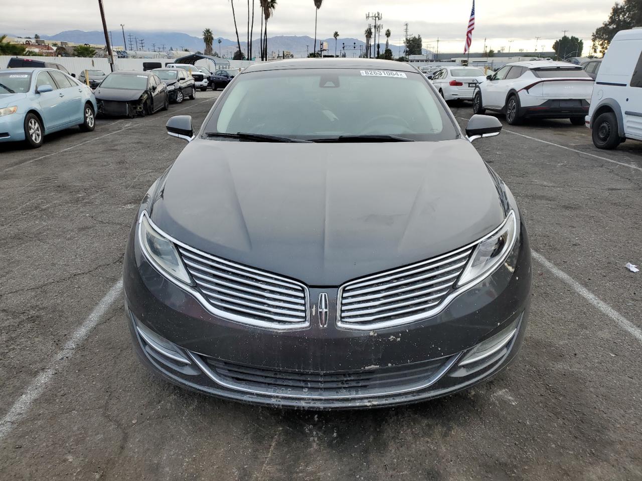 2016 Lincoln MKZ VIN 3LN6L2LU4GR603616 Copart auction photo, rear end / minor dent/scratches damage thumbnail 5
