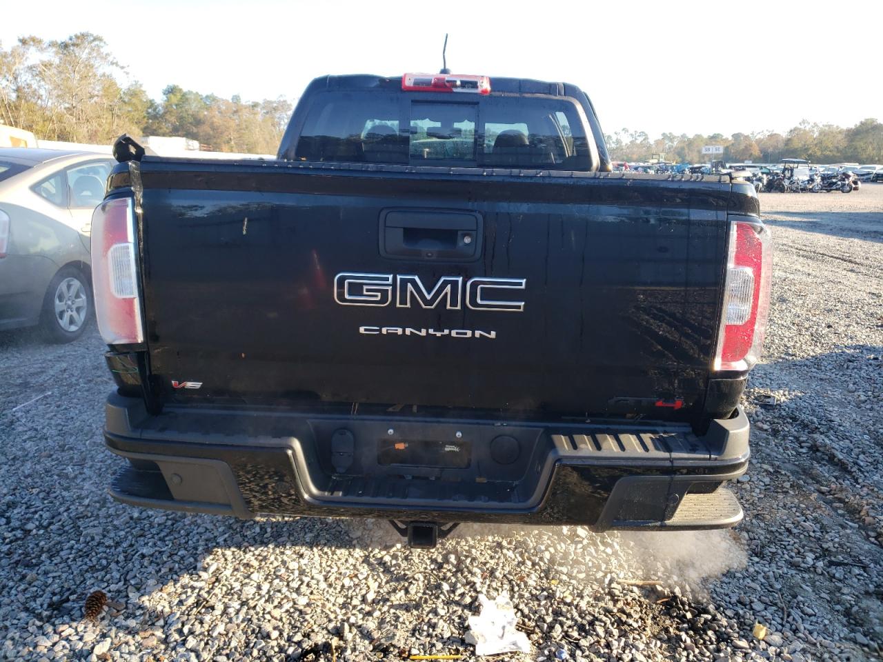 2022 GMC Canyon VIN 1GTG6FEN2N1182208 Copart auction photo, rear end / top/roof damage thumbnail 6