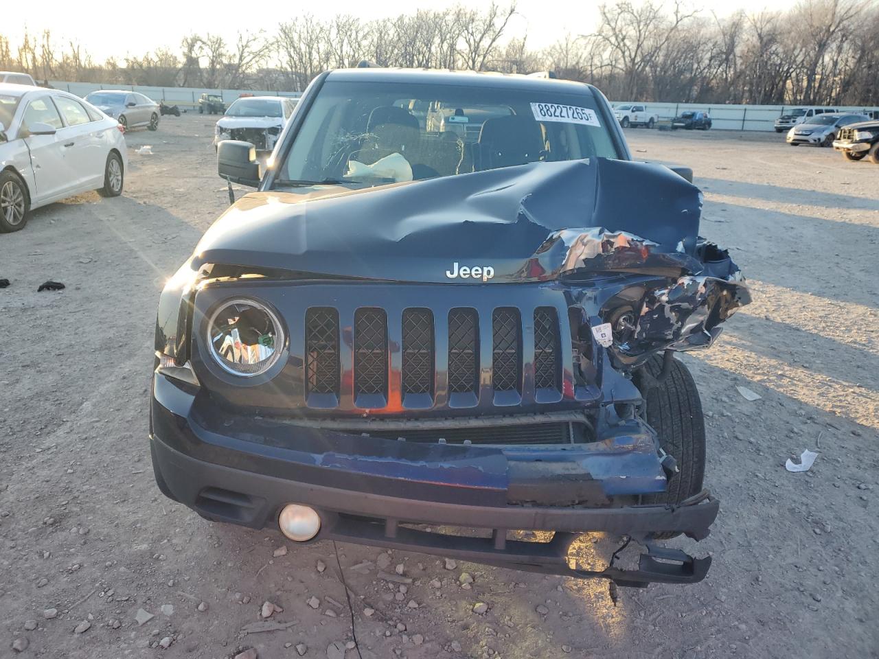 2012 Jeep Liberty (Patriot) VIN 1C4NJPBA0CD586911 Copart auction photo, front end / minor dent/scratches damage thumbnail 5