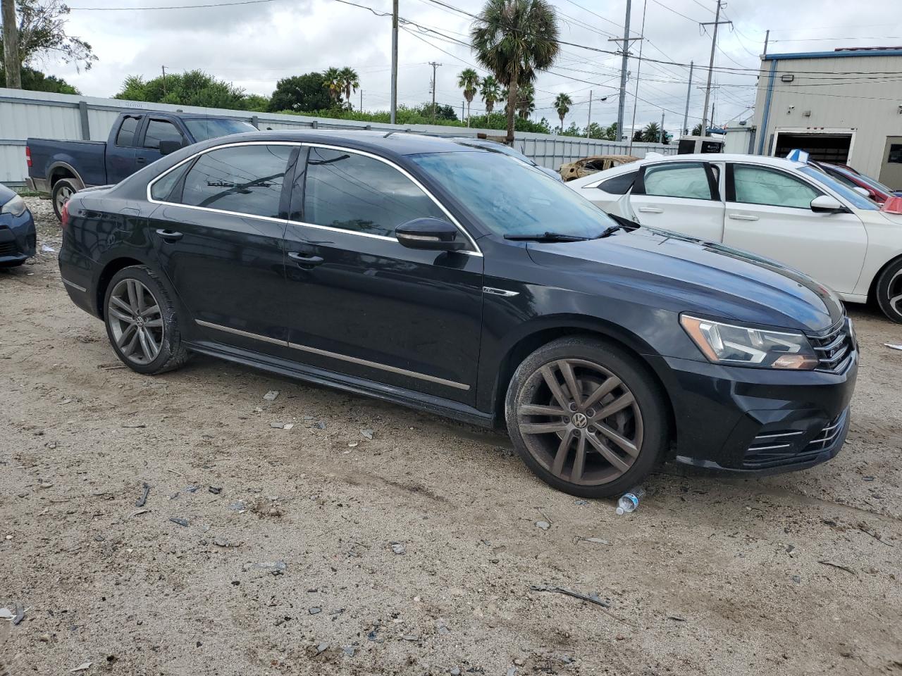 2017 Volkswagen Passat VIN 1VWDT7A32HC051615 Copart auction photo, side / front end damage thumbnail 4