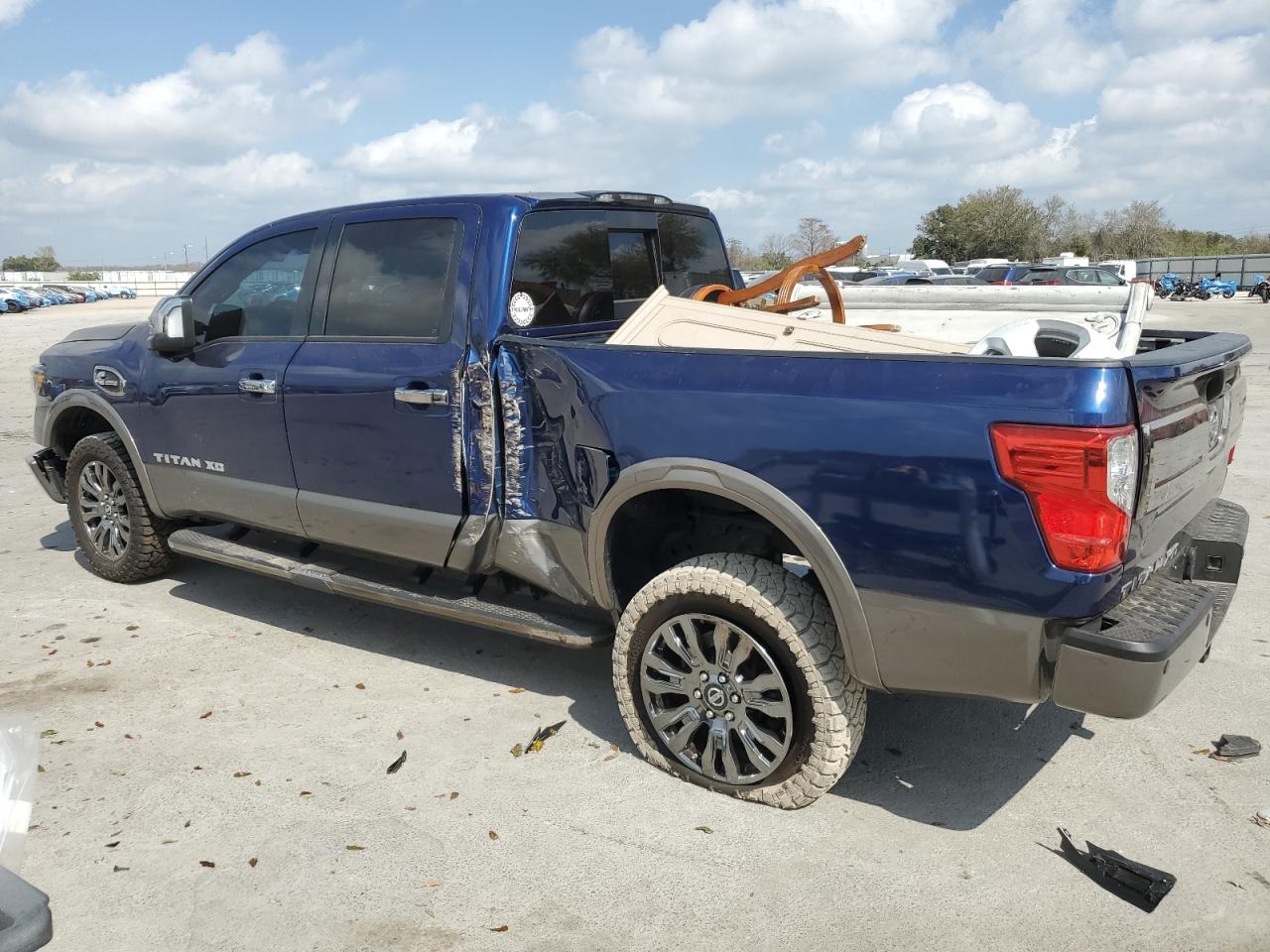 2016 Nissan Titan VIN 1N6BA1F22GN502362 Copart auction photo, front end / side damage thumbnail 2