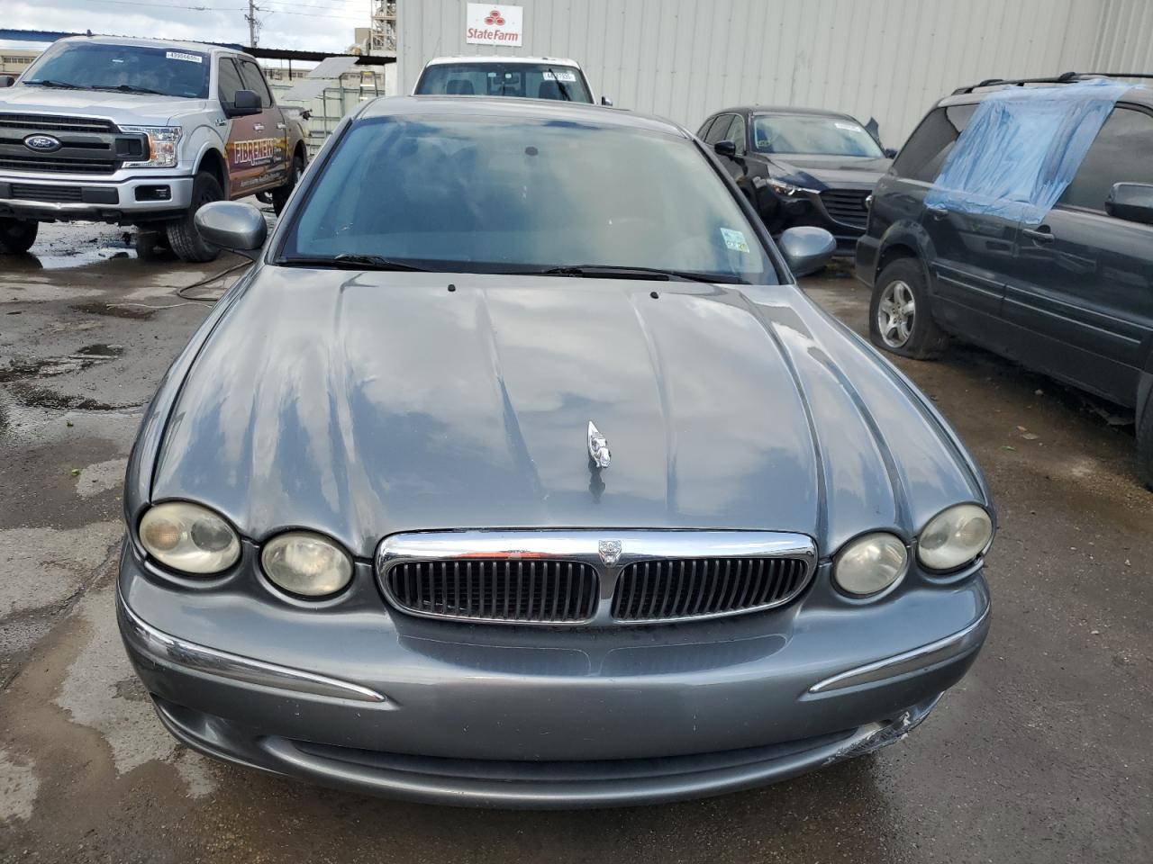 2002 Jaguar X-Type VIN SAJEA51D12XC84576 Copart auction photo, rear end damage thumbnail 5