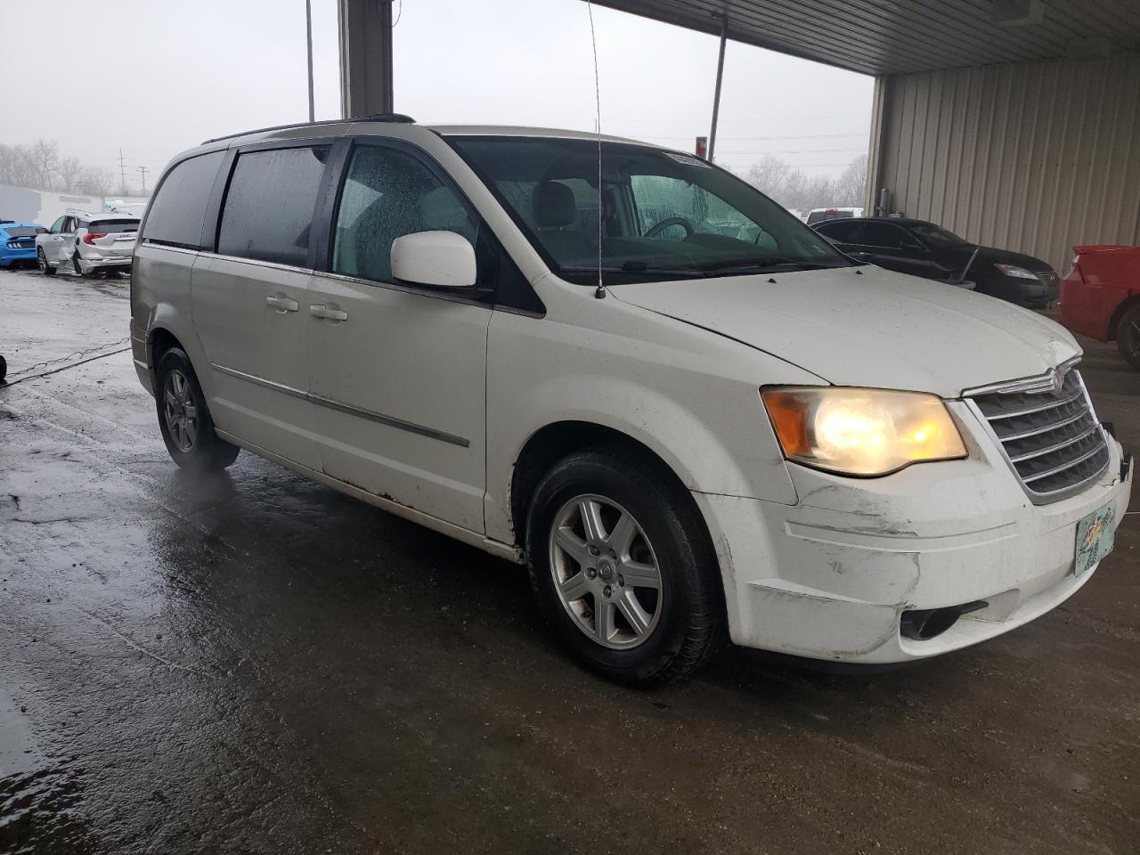 2010 Chrysler Town & Country VIN 2A4RR5D18AR309374 Copart auction photo, front end / side damage thumbnail 4
