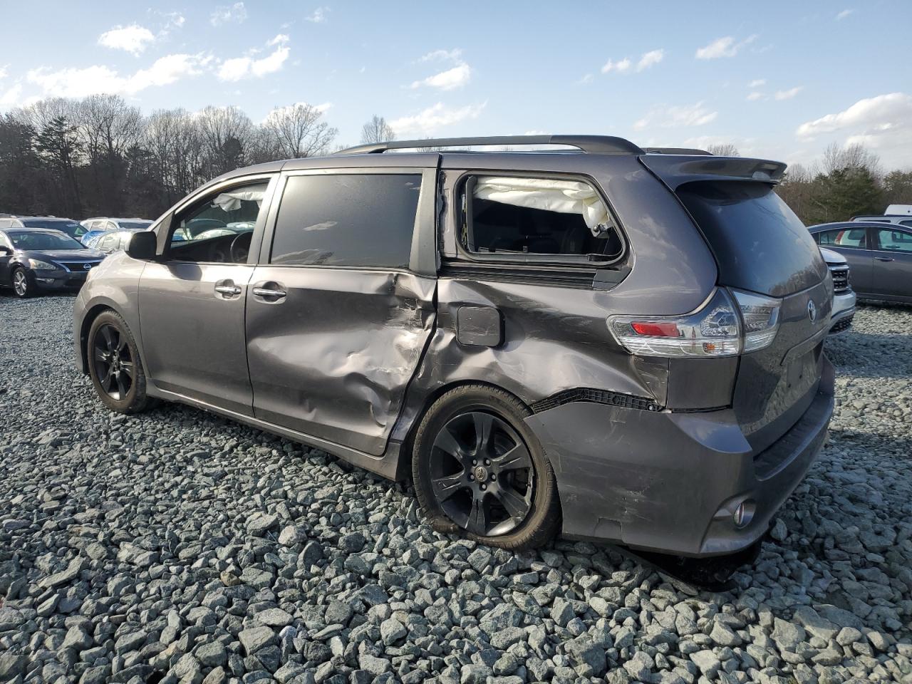 2015 Toyota Sienna VIN 5TDXK3DC0FS583092 Copart auction photo, side / rear end damage thumbnail 2