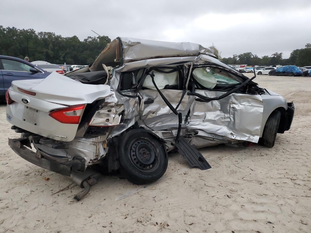 2012 Ford Focus VIN 1FAHP3E28CL444925 Copart auction photo, all over damage thumbnail 3