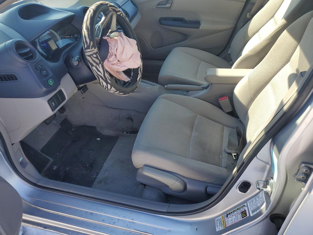2010 Honda Insight VIN JHMZE2H76AS000577 Copart auction photo, all over damage thumbnail 7