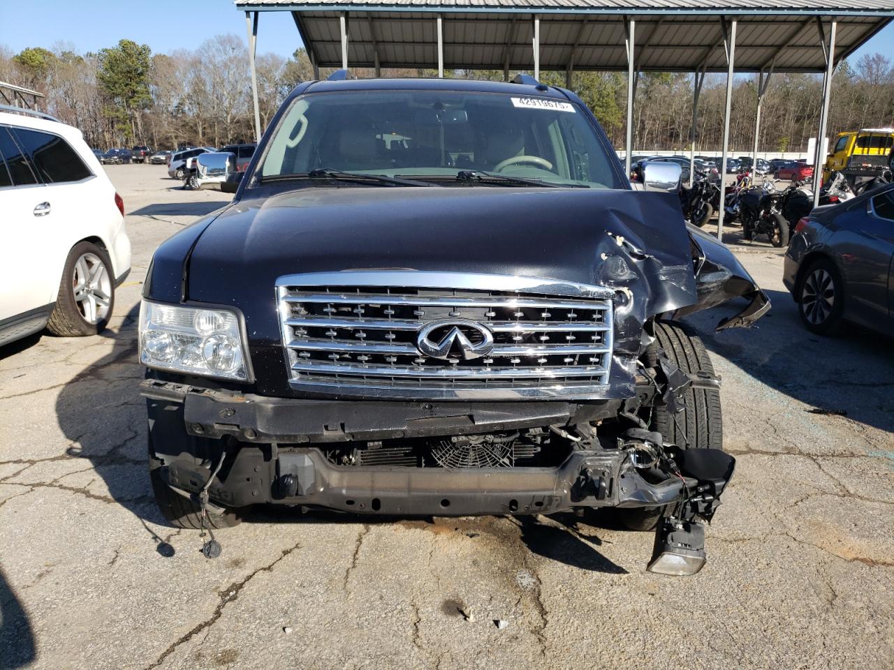 2010 Infiniti QX56 VIN 5N3ZA0ND7AN908291 Copart auction photo, front end damage thumbnail 5