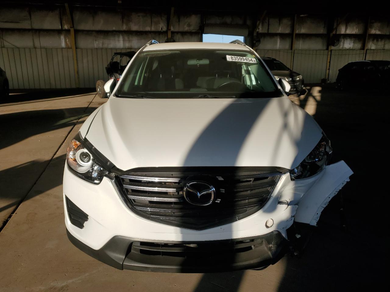 2016 Mazda CX-5 VIN JM3KE4BYXG0902158 Copart auction photo, front end damage thumbnail 5