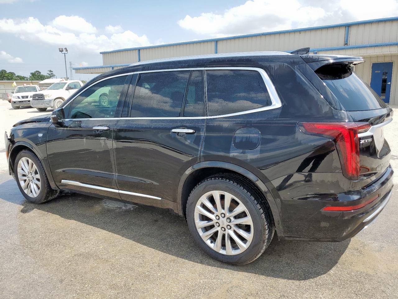 2020 Cadillac XT6 VIN 1GYKPCRSXLZ104502 Copart auction photo, front end / side damage thumbnail 2