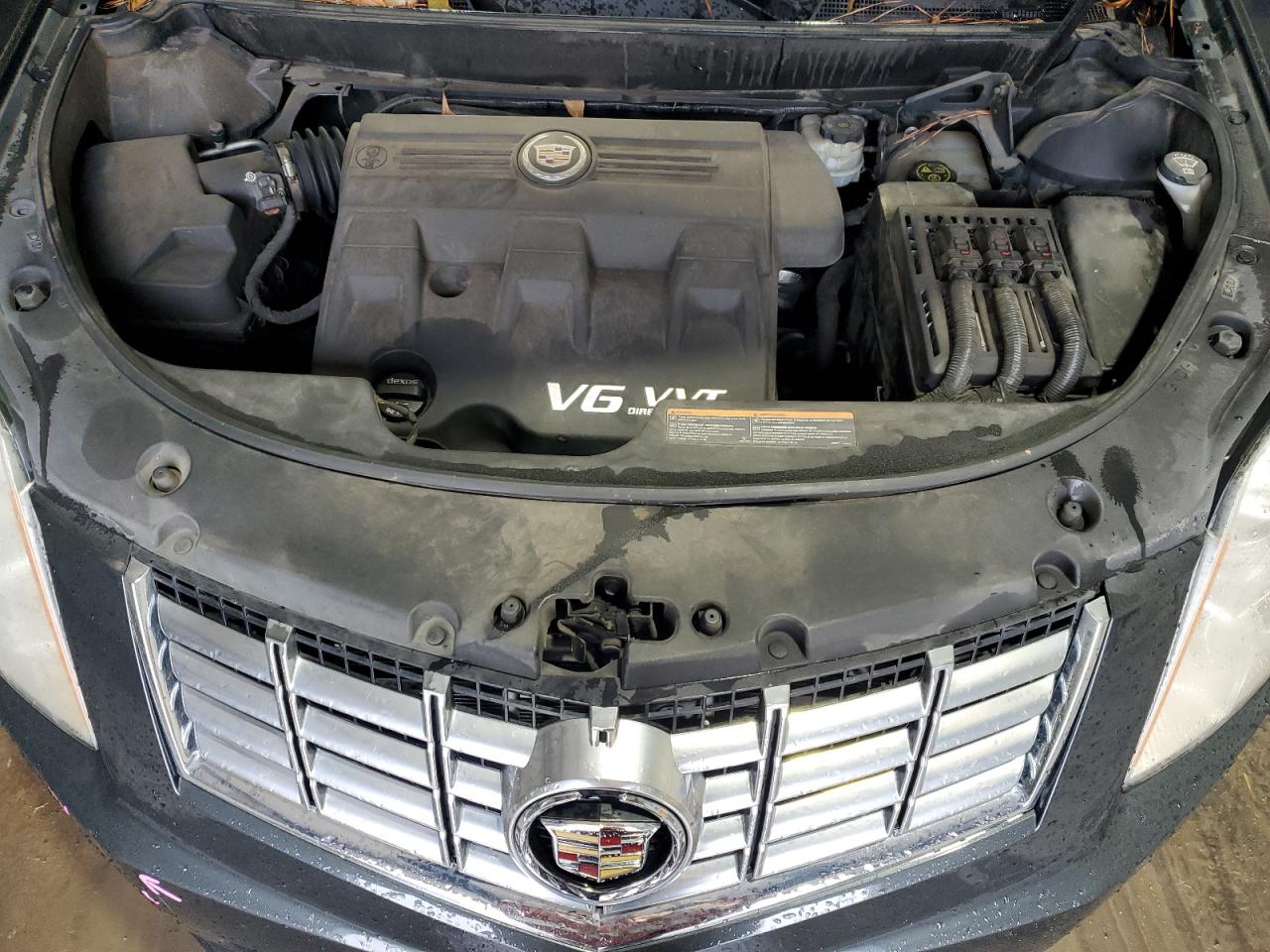 2015 Cadillac SRX VIN 3GYFNAE34FS523702 Copart auction photo, front end / minor dent/scratches damage thumbnail 12
