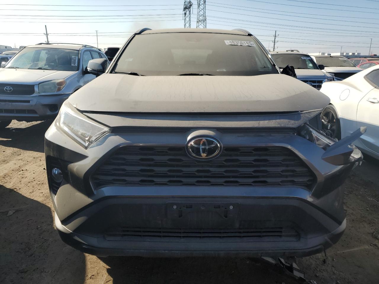 2020 Toyota RAV 4 VIN 2T3P1RFV9LC085036 Copart auction photo, side / front end damage thumbnail 5
