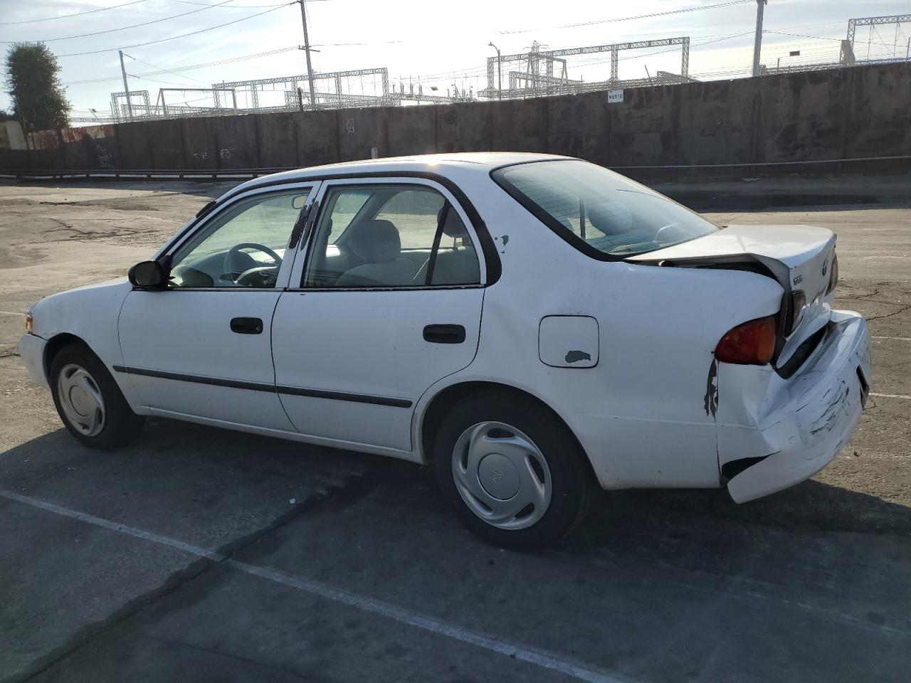 1999 Toyota Corolla VIN 1NXBR12E2XZ147156 Copart auction photo, rear end damage thumbnail 2