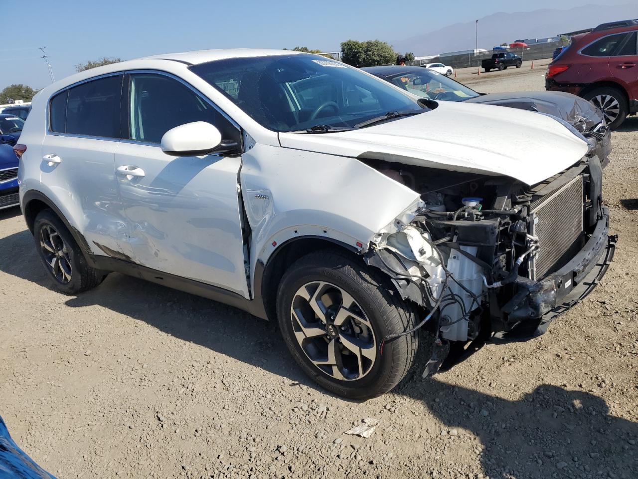 2022 KIA Sportage VIN KNDPMCACXN7000261 Copart auction photo, side / front end damage thumbnail 4