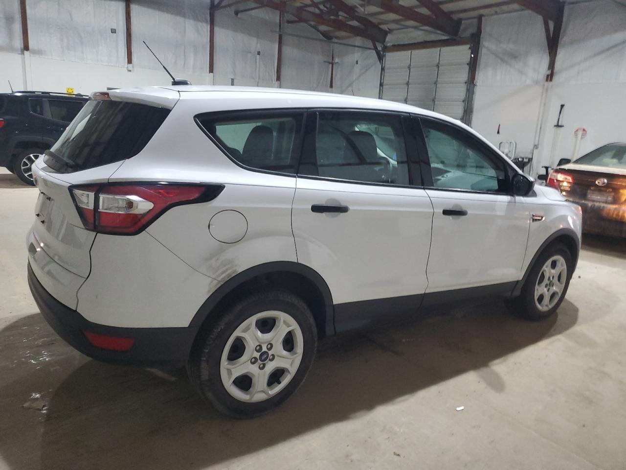 2017 Ford Escape VIN 1FMCU0F7XHUD82804 Copart auction photo, all over damage thumbnail 3