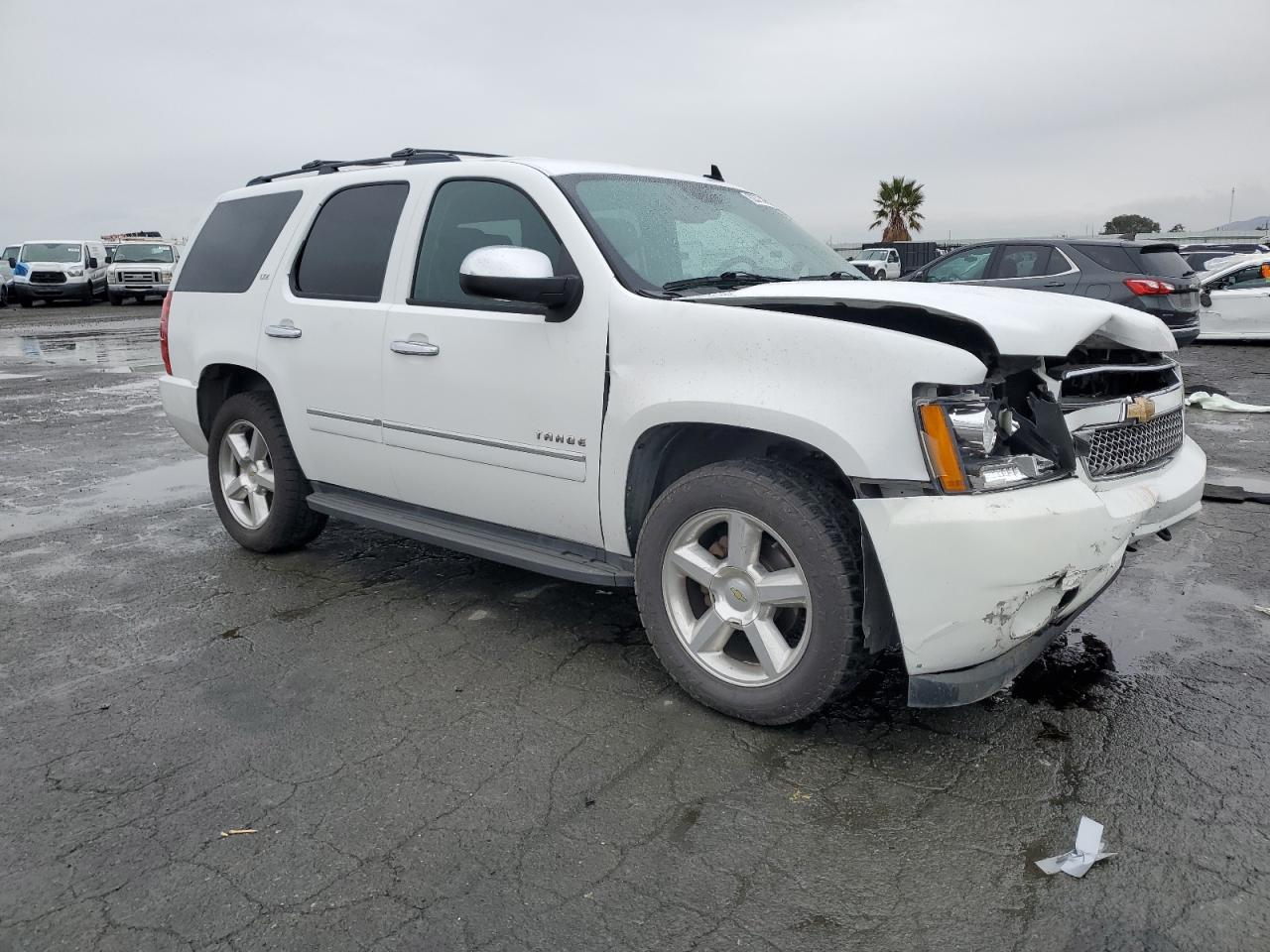 2010 Chevrolet Tahoe VIN 1GNUKCE04AR219599 Copart auction photo, front end / undercarriage damage thumbnail 4