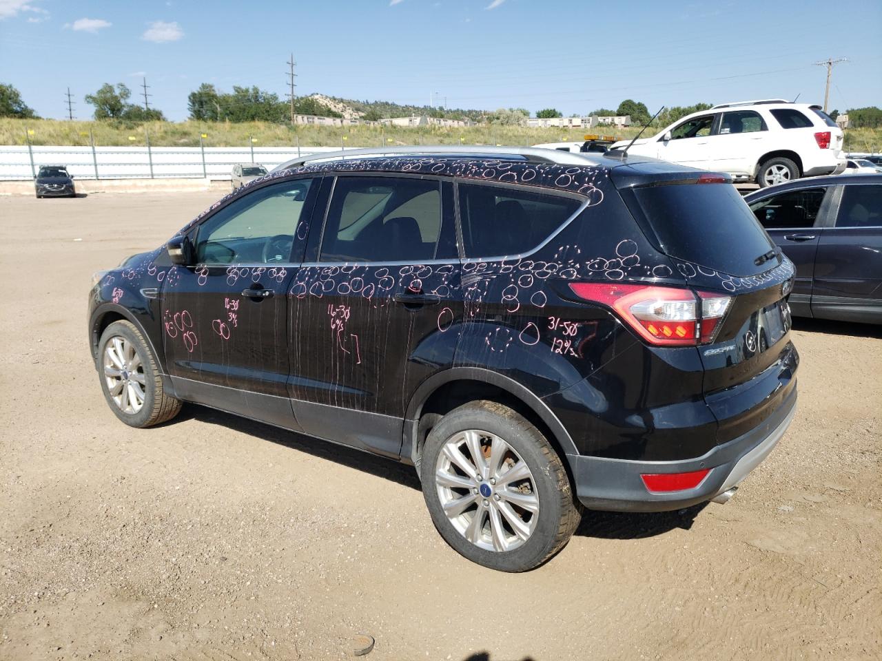 2017 Ford Escape VIN 1FMCU9J94HUD80687 Copart auction photo, hail damage thumbnail 2