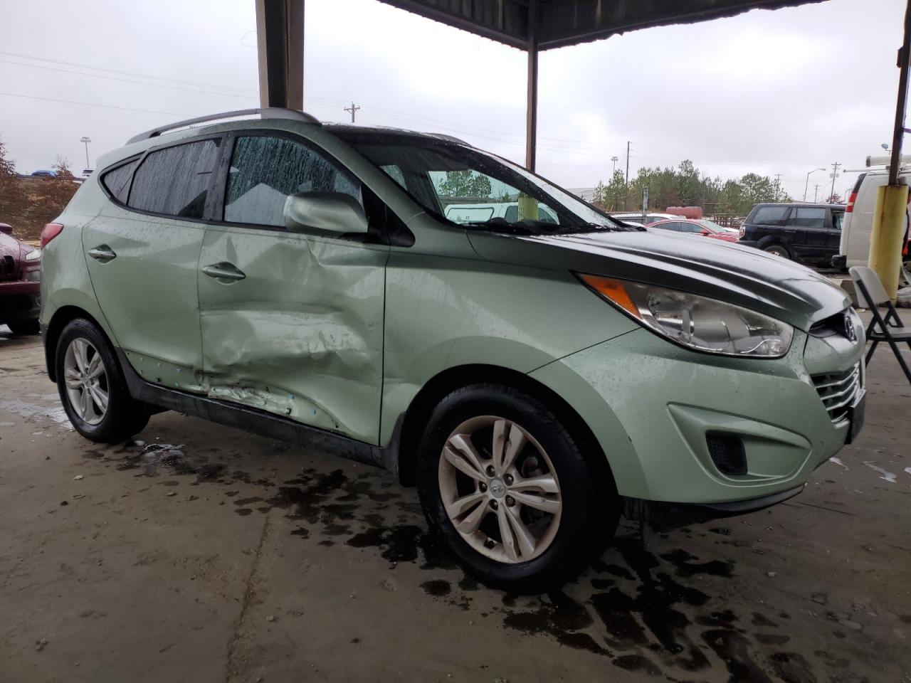 2011 Hyundai Tucson VIN KM8JU3AC1BU232097 Copart auction photo, side / front end damage thumbnail 4