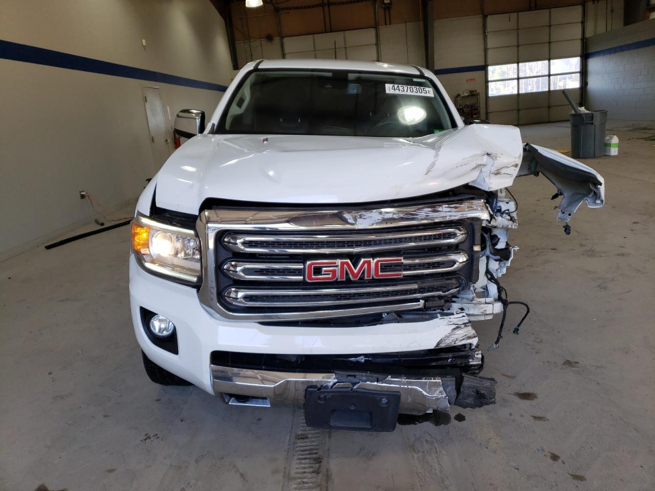 2017 GMC Canyon VIN 1GTP6DE12H1250996 Copart auction photo, front end / undercarriage damage thumbnail 5
