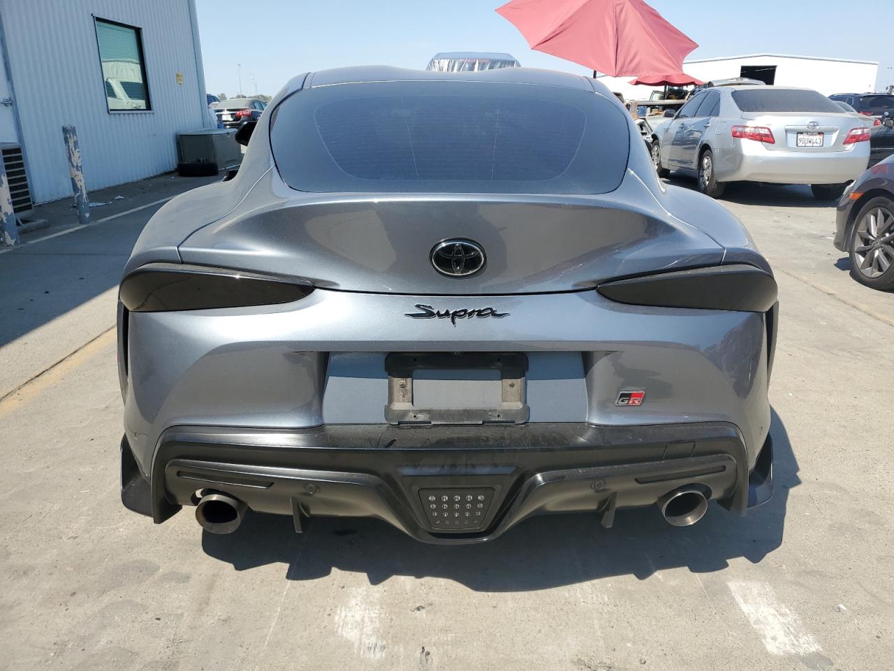 2021 Toyota Supra VIN WZ1DB0C01MW042477 Copart auction photo, side damage thumbnail 6