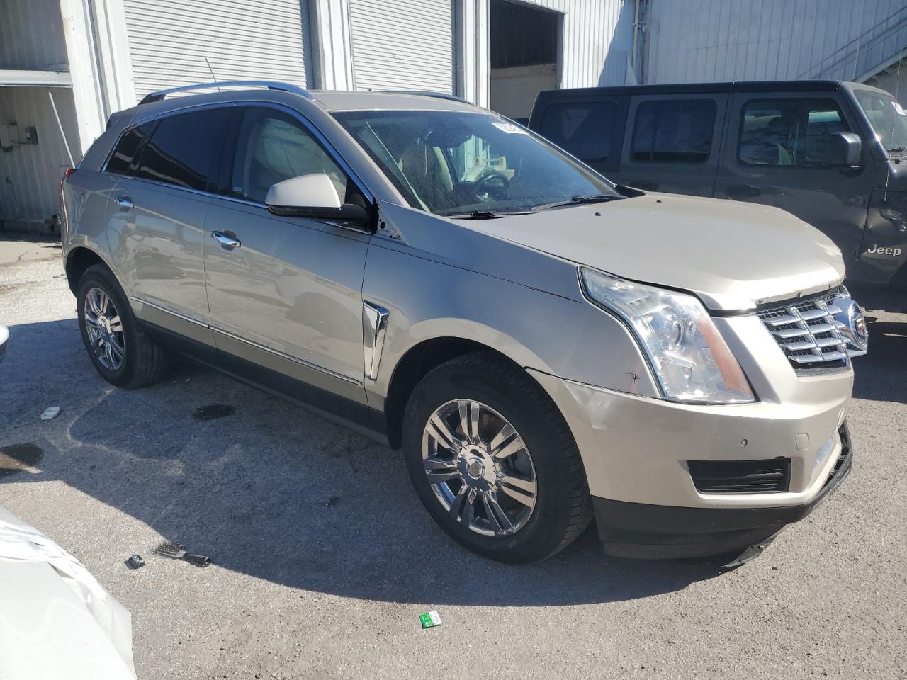 2016 Cadillac SRX VIN 3GYFNBE34GS515820 Copart auction photo, front end damage thumbnail 4