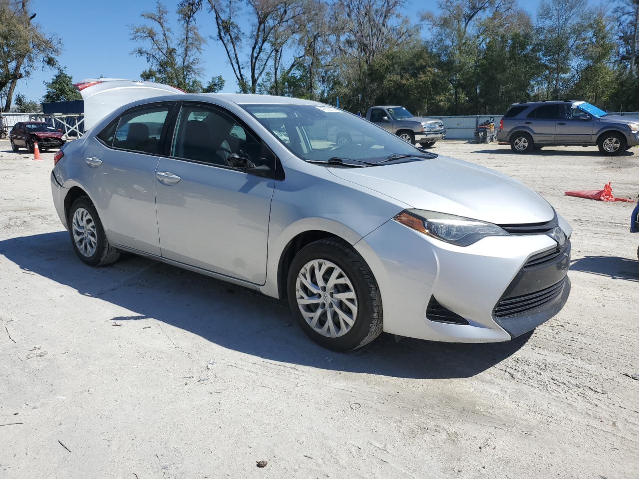 2019 Toyota Corolla VIN 5YFBURHE6KP946842 Copart auction photo, side / rear end damage thumbnail 4